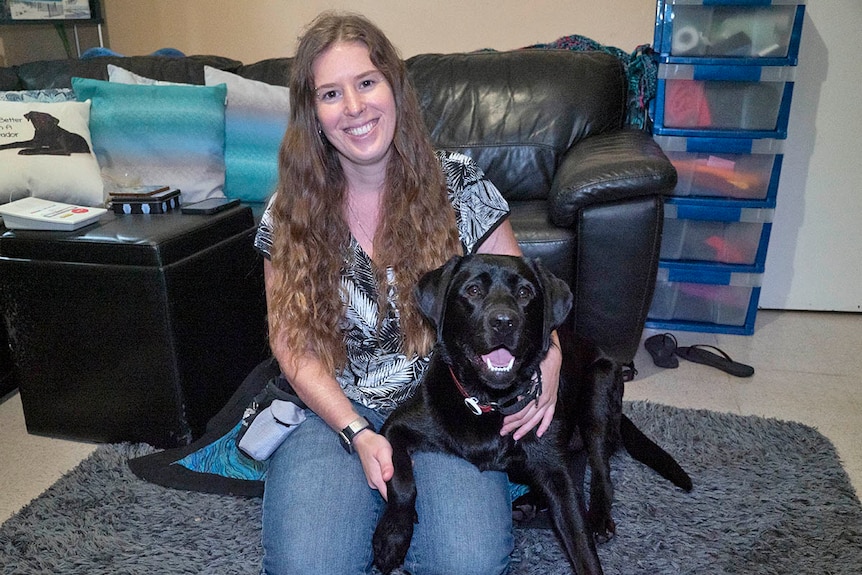Cassie  with black labrador dog Echo