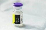 Vial of Pfizer vaccine at COVID-19 vaccination clinic.