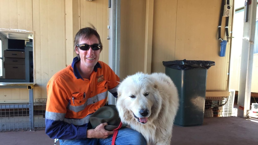 Environmental Manager Michael Robinson and Indie the guard dog