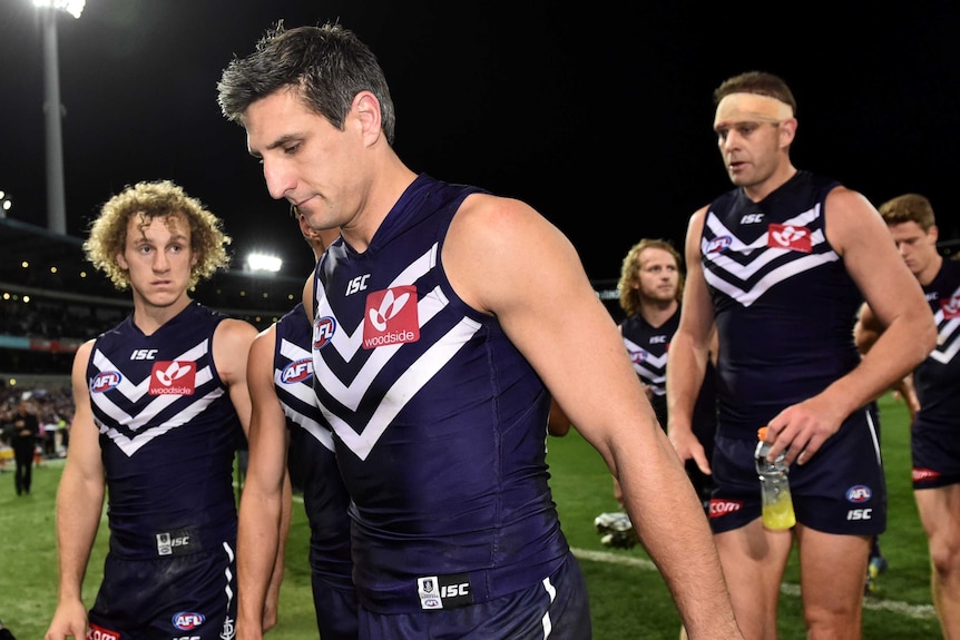 Matthew Pavlich walks off field after Dockers defeat