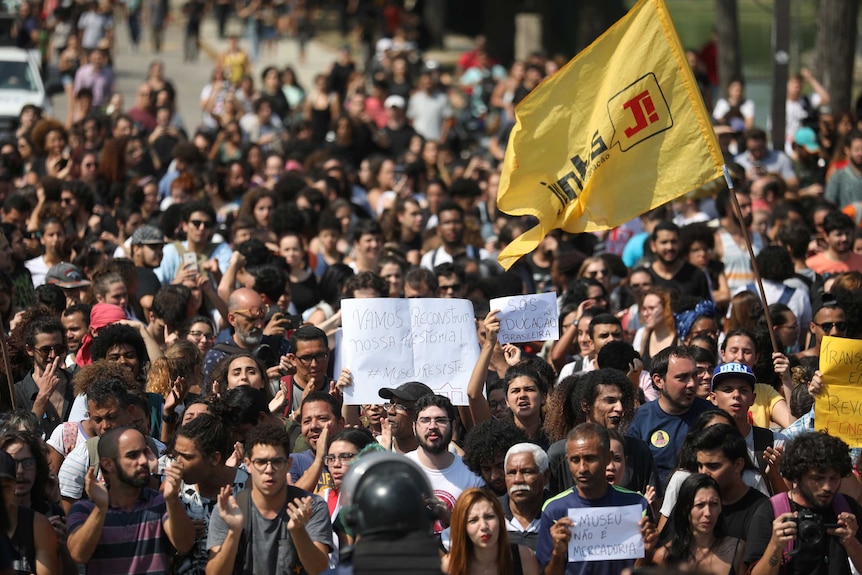 Police use teargas to disperse the angry crowd after fire destroyed Brazil's National Museum.