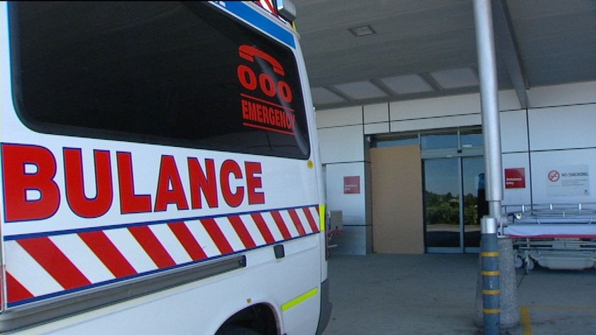 Ambulance sits near hospital doors after 4WD crashed into them