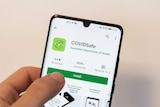 An illustration of the COVIDSafe app on a smartphone screen.