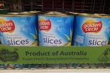 Golden Circle pineapples on a supermarket shelf saying Product of Australia from fresh Queensland pineapples.