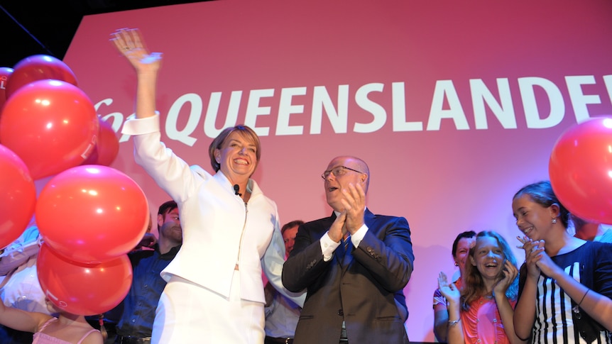 Anna Bligh and her husband Greg Withers wave during Queensland Labor's official election campaign launch.