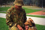 Military dog Bubbles with her handler