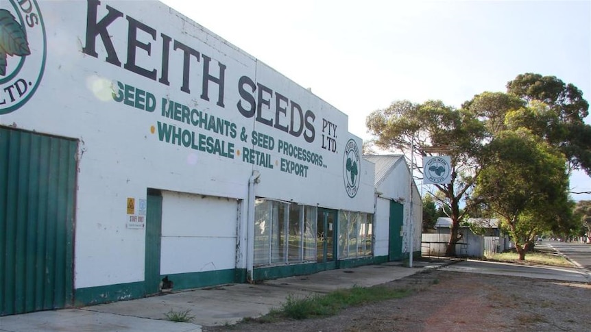 A white and green building with the name 'Keith Seeds' on the front.