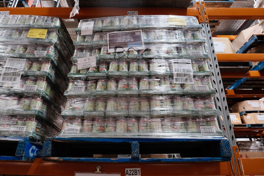 Shipment of pasta sauce bottles in a warehouse.