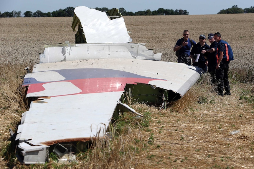 International experts inspect wreckage at MH17 crash site