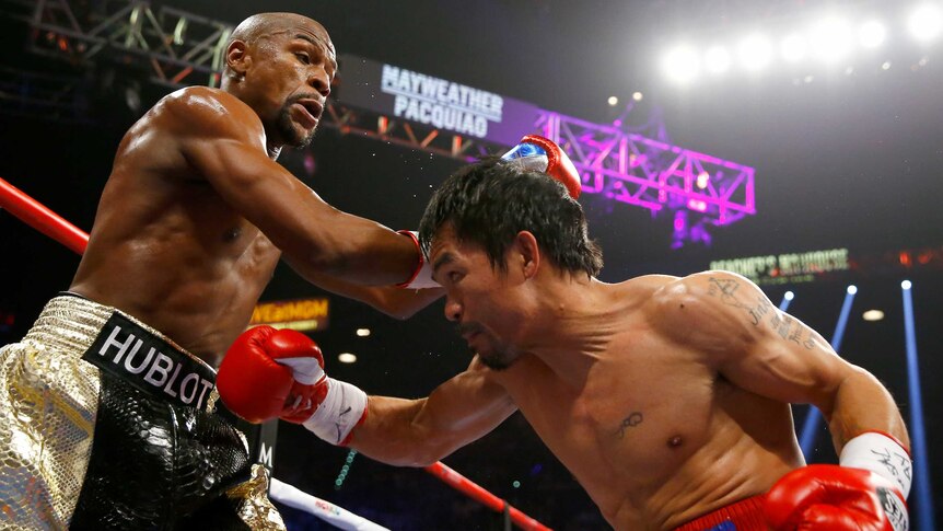 Pacquiao weaves under Mayweather counter