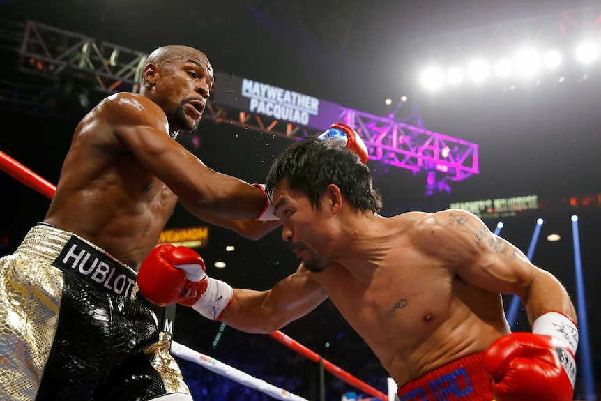 Pacquiao weaves under Mayweather counter