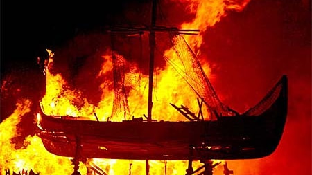 A 12-metre-long viking longship is burned in Edinburgh.
