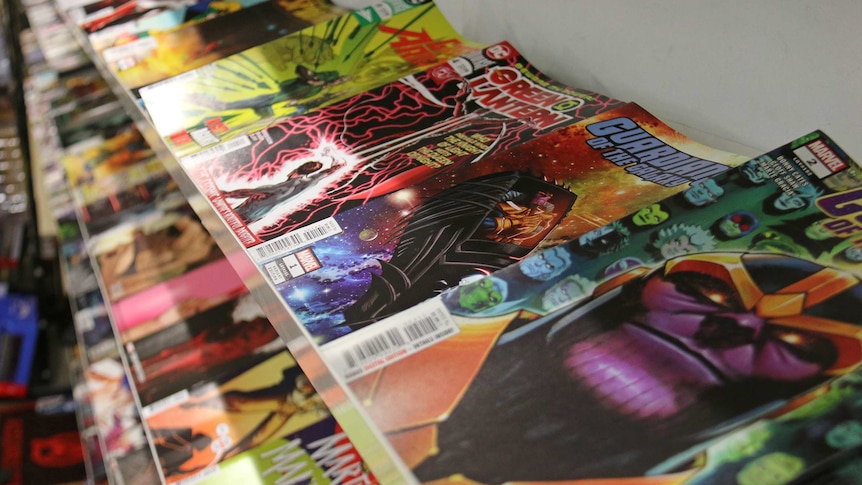 Superhero comic books sit on the shelves of Brisbane comics store Comics Etc.