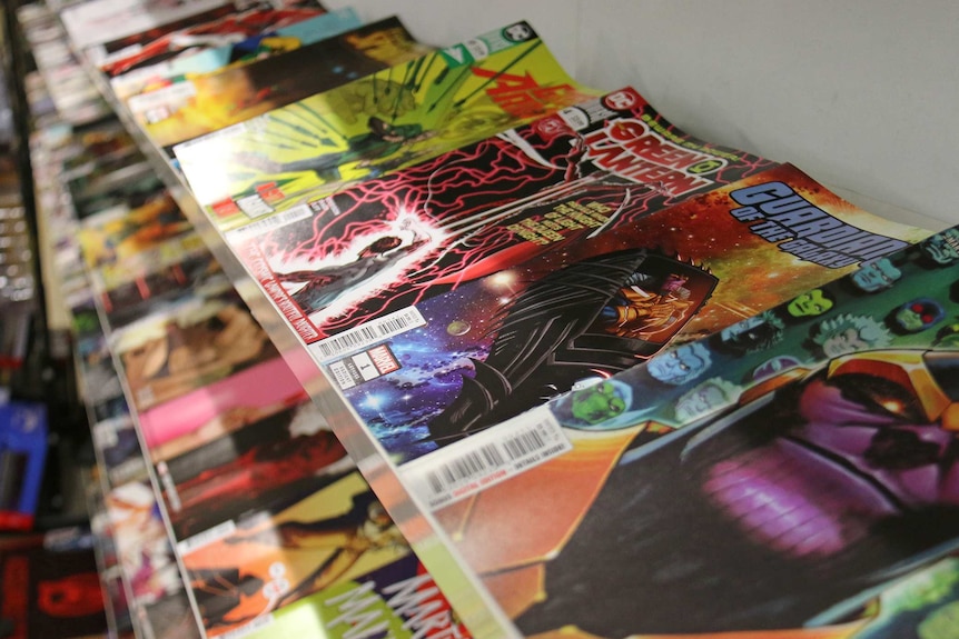 Superhero comic books sit on the shelves of Brisbane comics store Comics Etc.