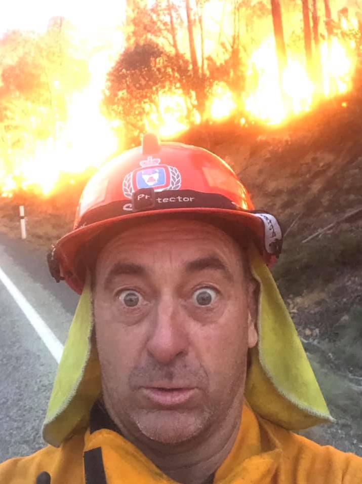 Firefighter's selfie in front of a backburn operation in Tasmania.