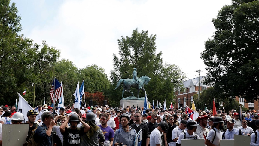 White supremacists gather under a statue of Robert E Lee