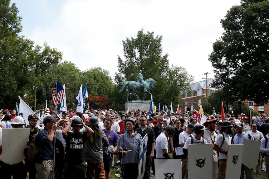 White supremacists gather under a statue of Robert E Lee