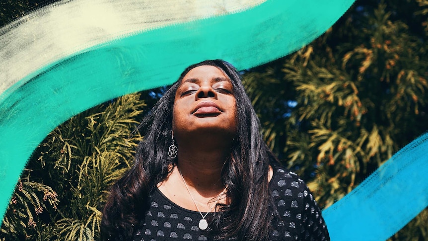 Woman closing her eyes and lifting her face towards the sun, with illustrated lines around her, for a story about optimism.