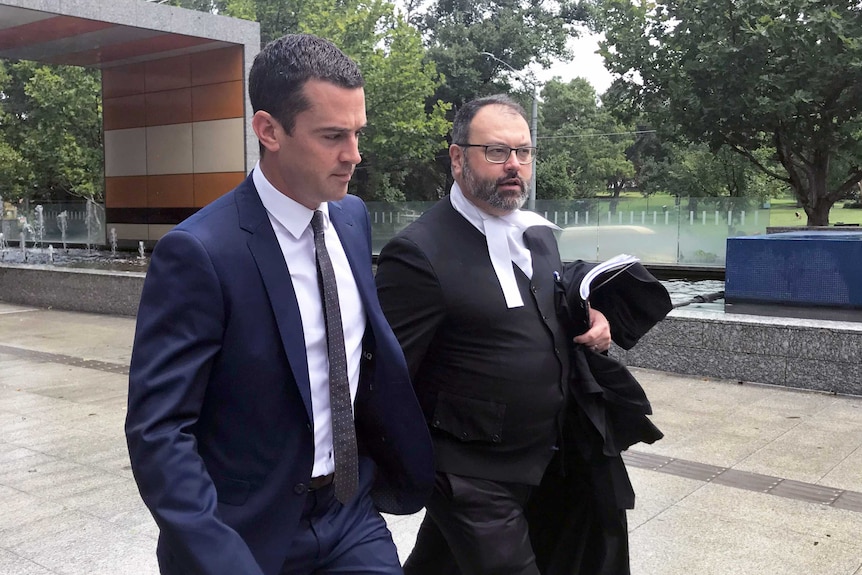 David De Garis leaves court (left) with his lawyer.