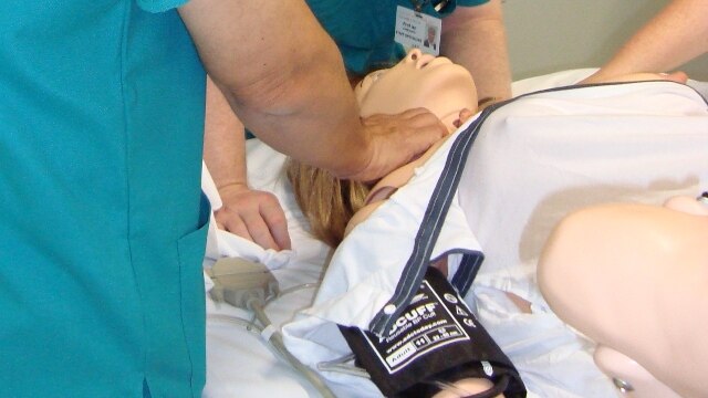 The real thing: as Newcastle's John Hunter hospital uses a lifelike manikin to simulate childbirth.