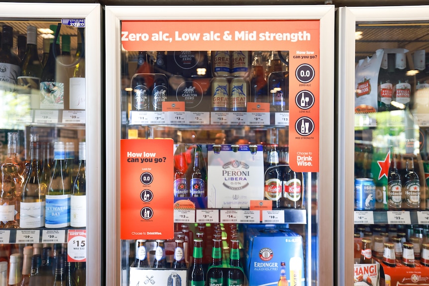 Non-alcoholic drinks in a cabinet in a bottle shop