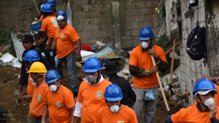 Volunteers search for victims of Guatemalan landslide