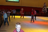 A young boy skates around an ice rink in Alice Springs in December 2009.