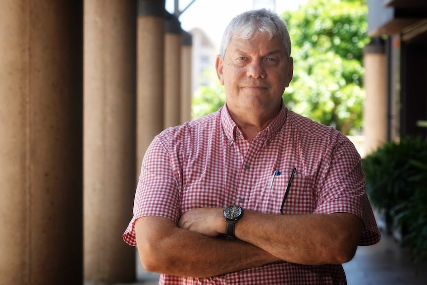 A front-on image of AMSANT chief executive officer John Paterson with arms folded in Darwin.