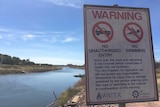 A warning sign next to the main irrigation channel in the Ord Valley.