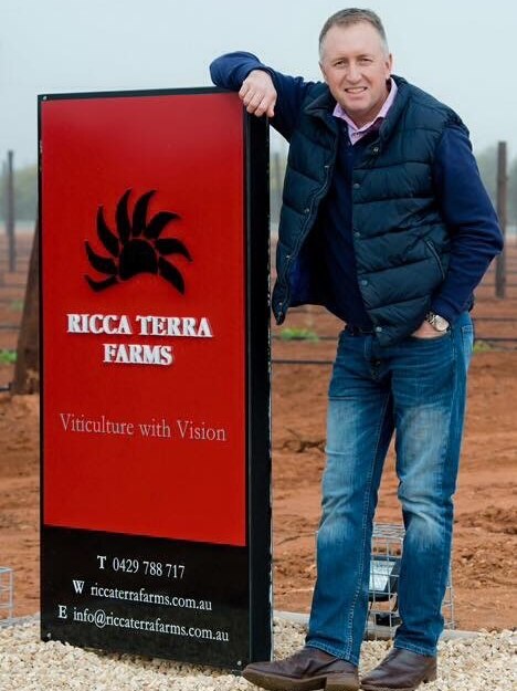 Owner and general manager of Ricca Terra Farms Ashley Radcliff standing at his farm near the vineyard.