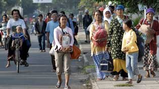 Displaced ... the Indonesian Govt says more than 50,000 people are homeless.