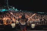 A large mosh pit at a Schoolies event in 2018 at Surfers Paradise beach.