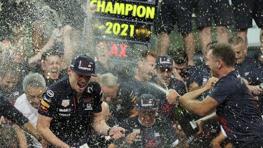 Max Verstappen celebrates his win in Abu Dhabi