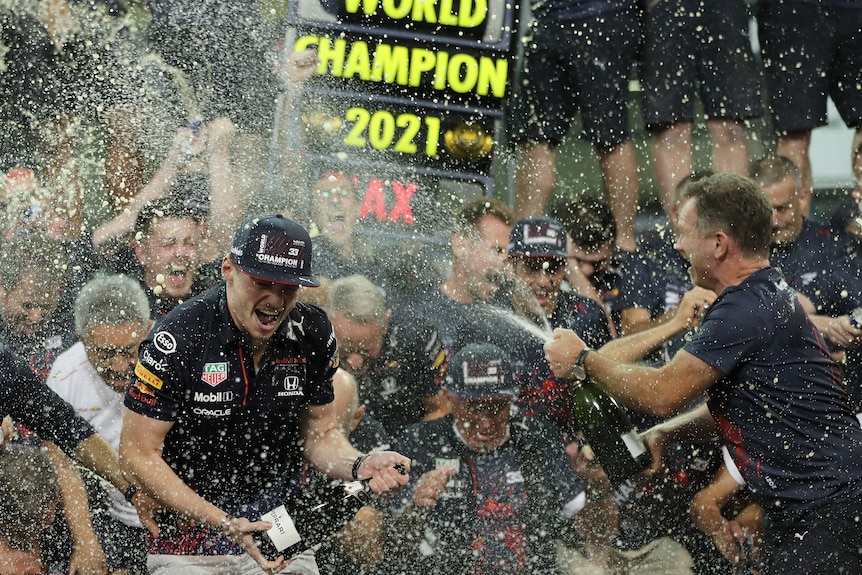 Max Verstappen celebrates his win in Abu Dhabi