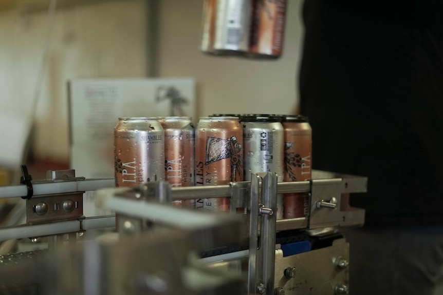 canning machine and beer cans