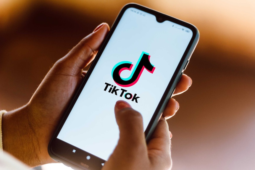 photo illustration the TikTok logo