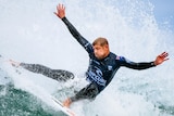 Mick Fanning surfing a wave
