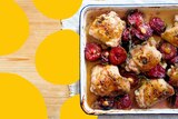 Chicken tray bake with plums, lemon and thyme cooked.