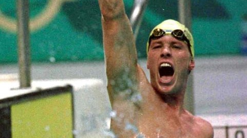 Kieren Perkins celebrates after winning gold in the men's 1,500m freestyle at the Atlanta Olympics.