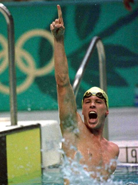 Kieren Perkins celebrates after winning gold in the men's 1,500m freestyle at the Atlanta Olympics.