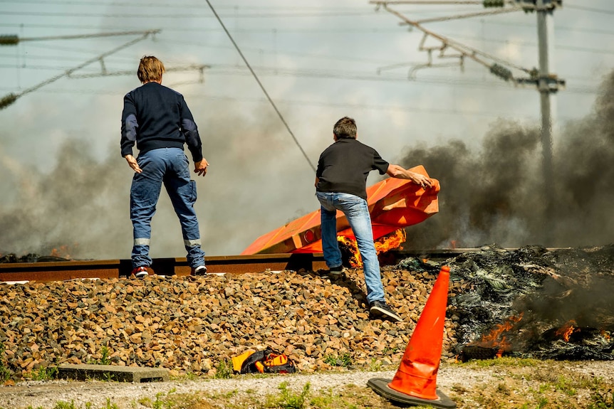 Striking employees block railway tracks near Calais