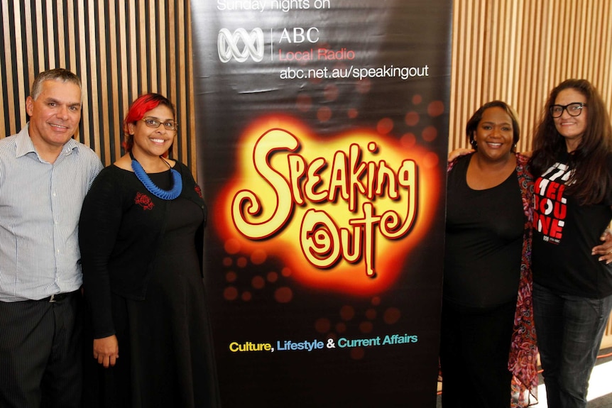 Four people stand next to the ABC's Speaking Out banner.