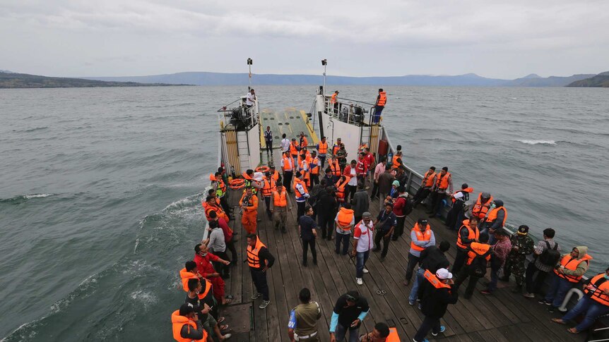 An Indonesia search and rescue team searches for the ferry