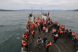 An Indonesia search and rescue team searches for the ferry
