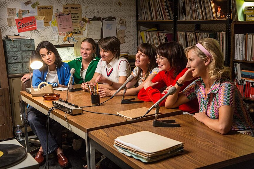 Production still from the movie Battle of the Sexes showing a group of female tennis players