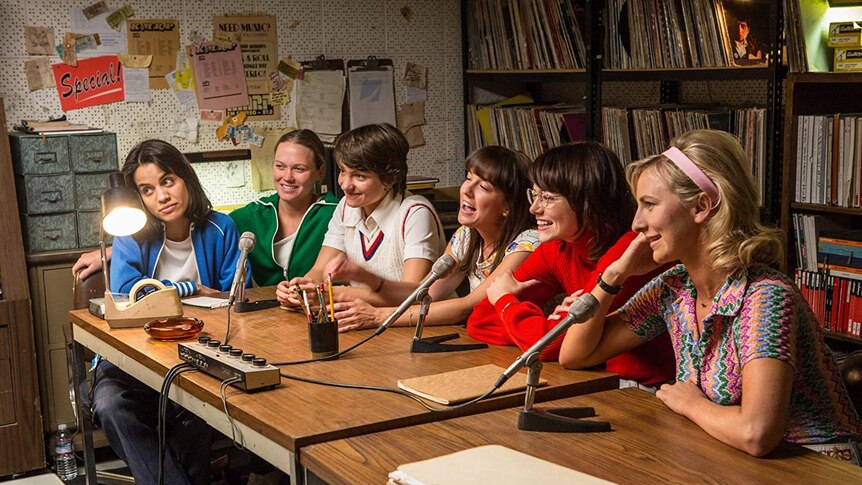Production still from the movie Battle of the Sexes showing a group of female tennis players