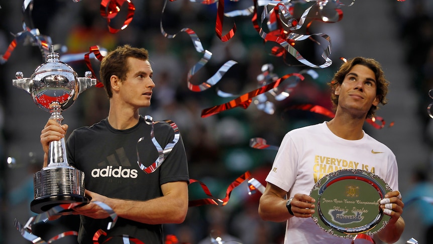 Andy Murray (L) came from a set down to scorch past Rafa Nadal in the final two sets, dropping only two games along the way.