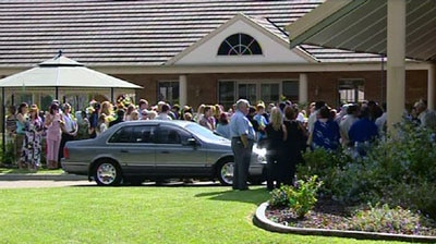 Family and friends gather for the funeral of Dylan Rayward, whose death sparked the Macquarie Fields riots.