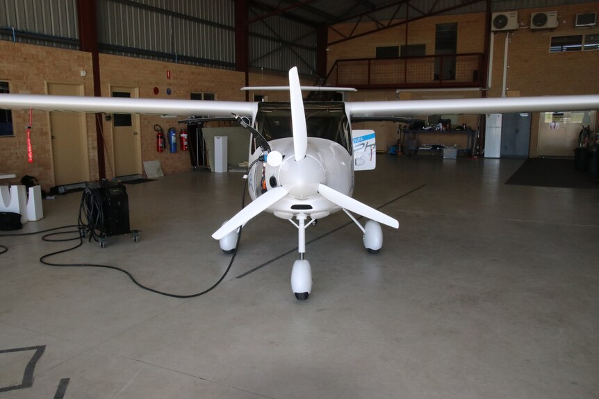 A light plane in a hangar