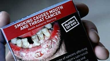 Graphic new warnings on cigarette packages - mouth cancer risk.
